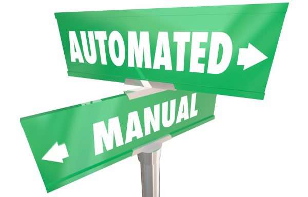 Signpost showing two signs one for automations and one for manual
