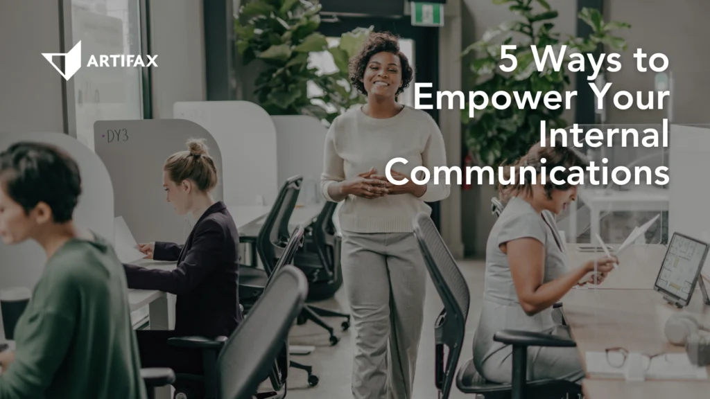 Employees working in a modern office while a smiling woman stands confidently in the center, representing empowered internal communications, with the Artifax logo in the corner.