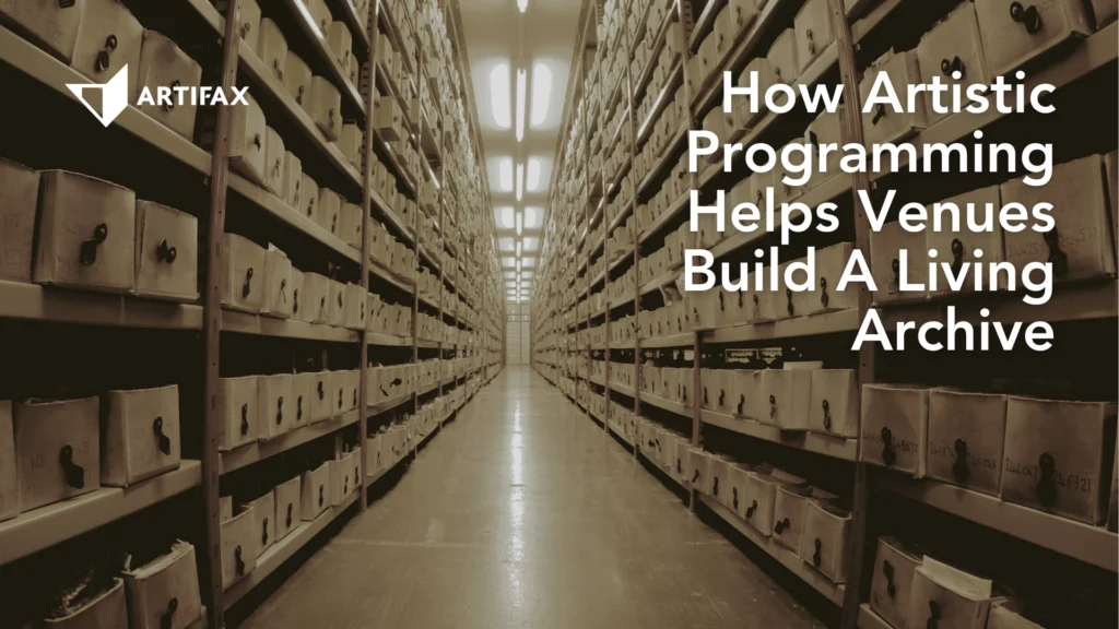 Rows of archive shelves filled with labelled boxes, viewed from a central aisle, with Artifax branding and the text How Artistic Programming Helps Venues Build A Living Archive