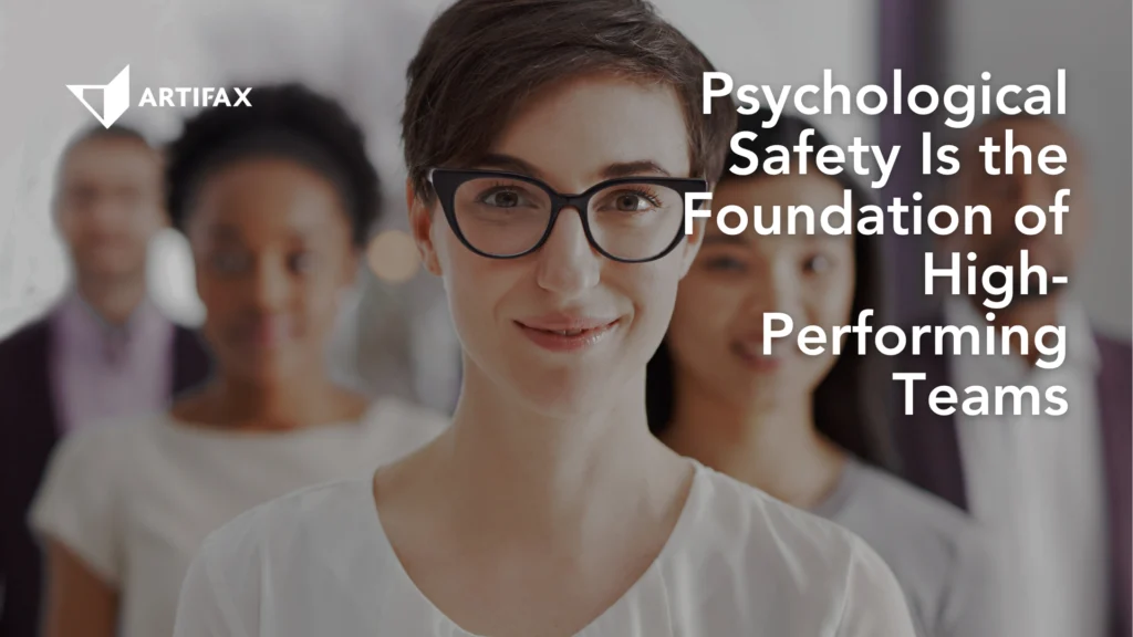 A confident person standing at the front of a diverse group of colleagues, representing trust, openness, and psychological safety within a team.
