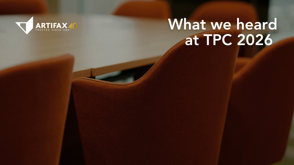 Branded Artifax 40 graphic with the text “What we heard at TPC 2026” over a blurred conference room setting with orange chairs and a meeting table.